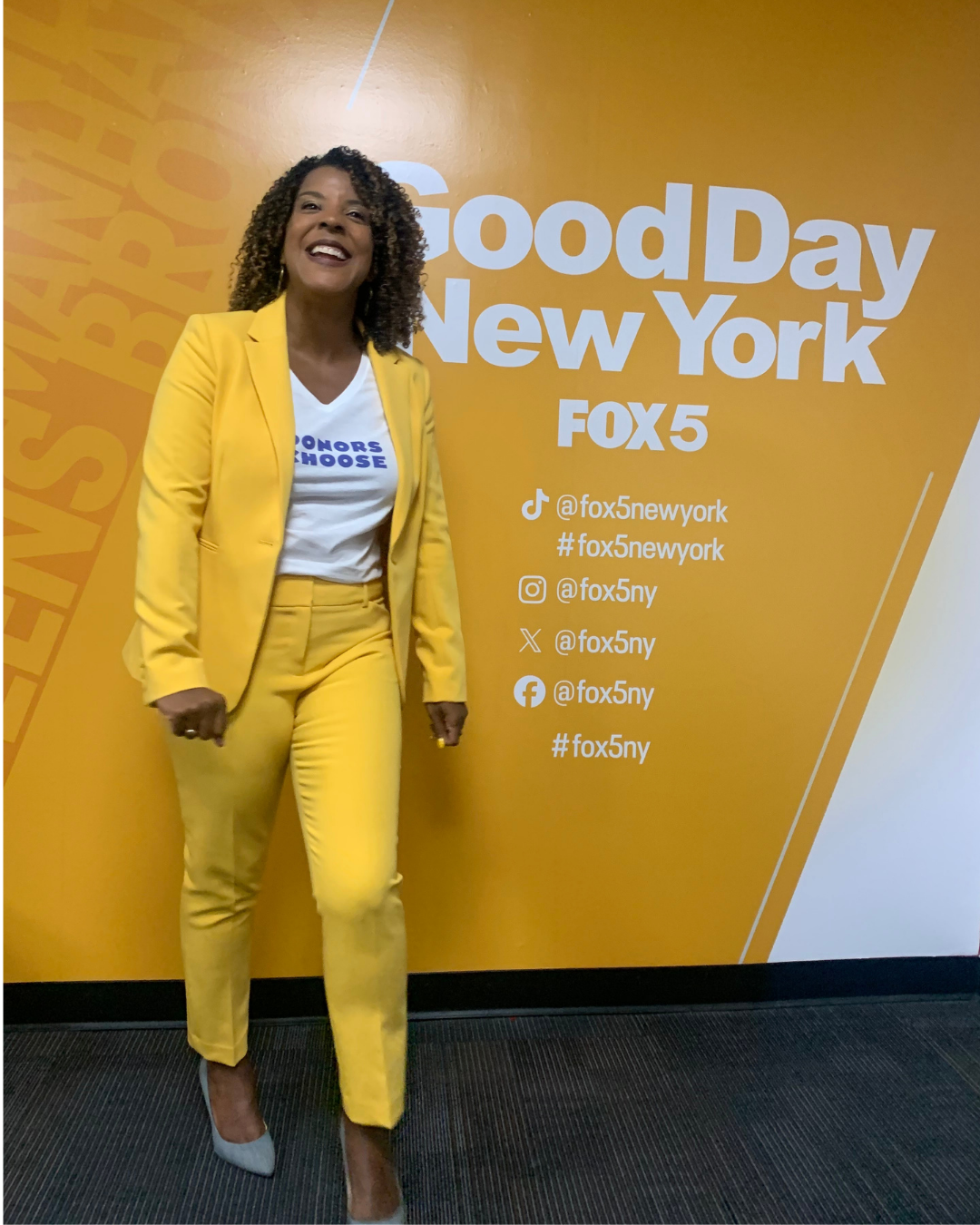 Jinan O'Connor in a yellow suit at Good Day New York