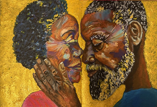 A couple resting their foreheads together against a warm gold background